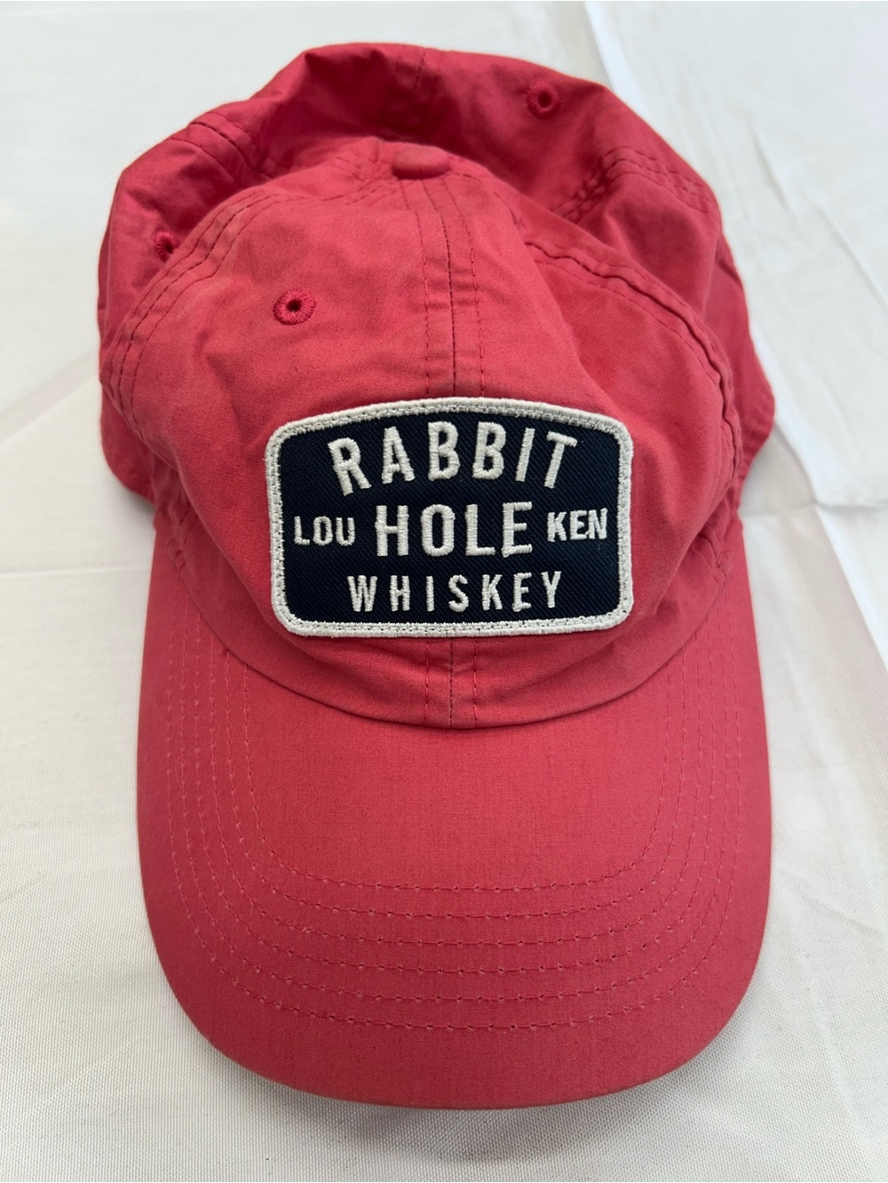 Rabbit Hole Whiskey Bourbon Distillery Unstructured Dad Hat Coral Red Cap